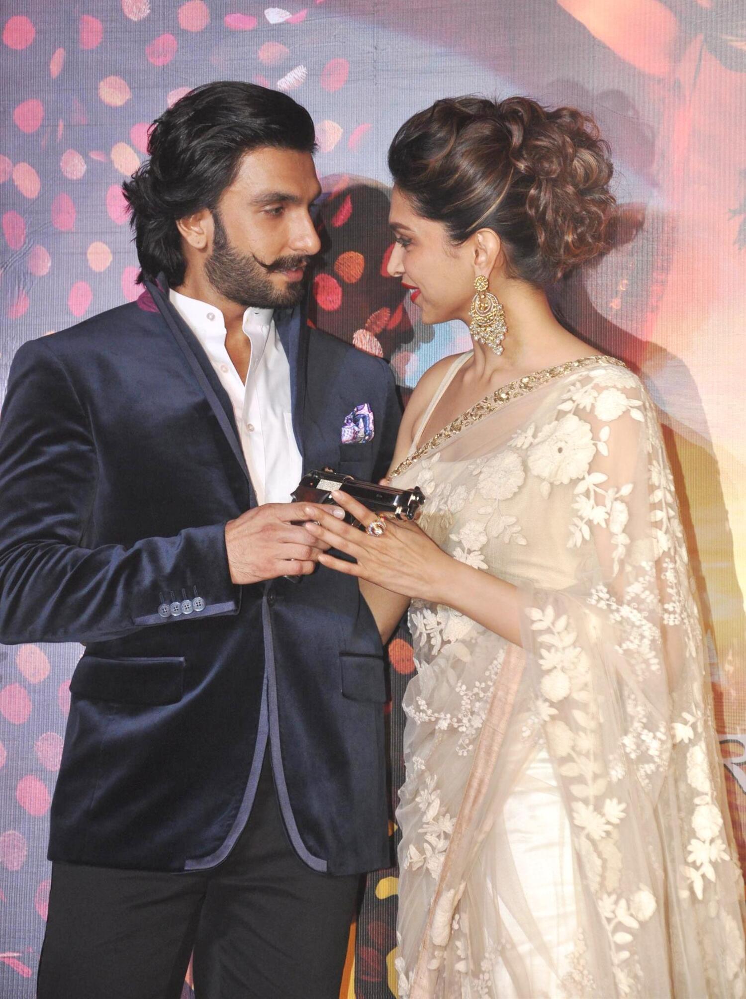 Deepika Padukone And Ranveer Singh Posing At Film Ram Leela First Look Trailer Launch In Mumbai