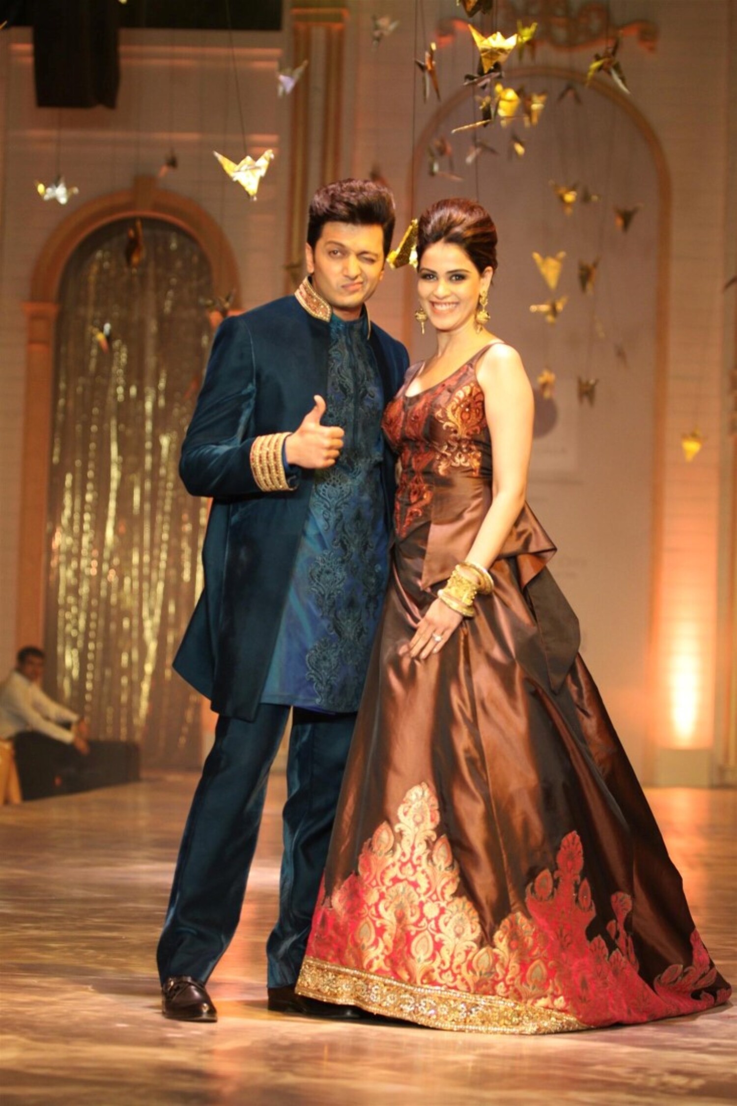 Ritesh Deshmukh with wife Genelia walking the ramp for Neeta Lulla at