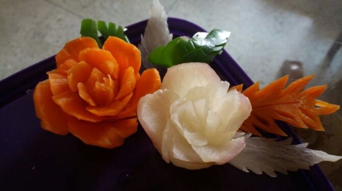 Beautiful carved roses from carrot nd radish