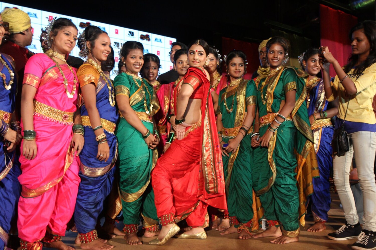 Vidya Balan posing with lavani dancers at the launch of lavani song ...